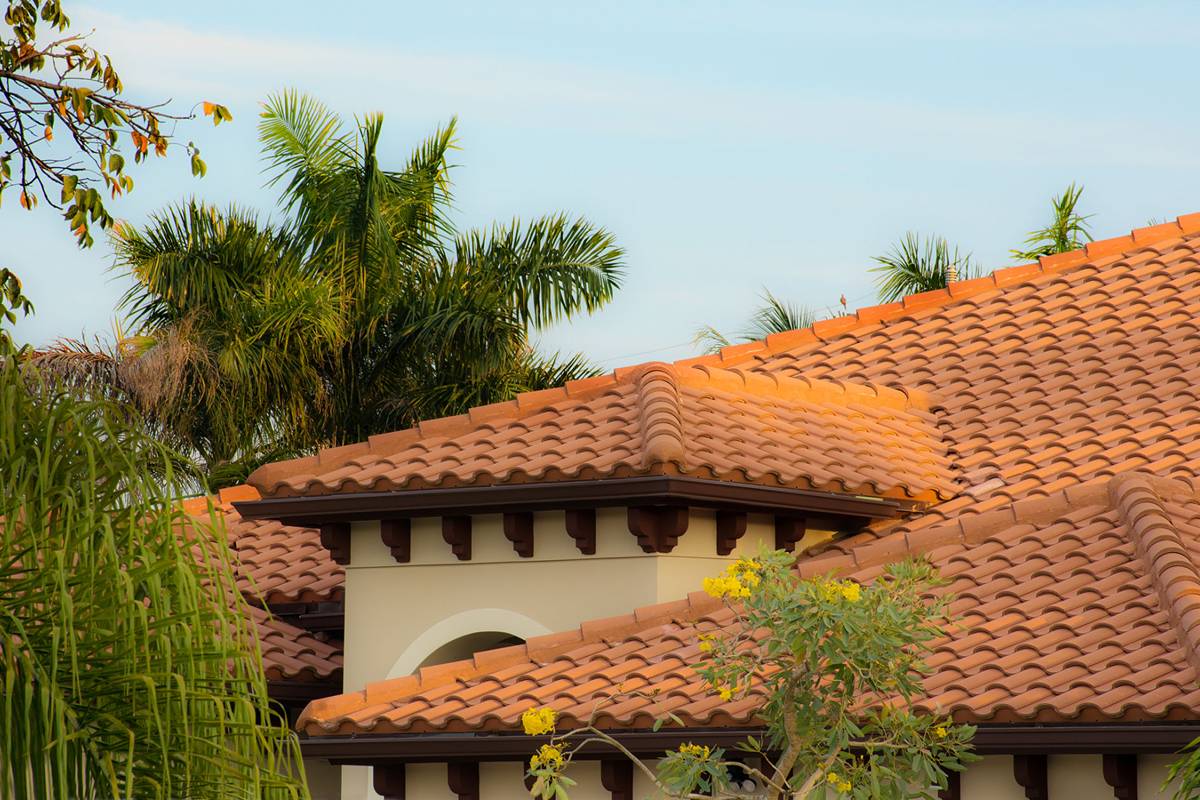 A roofing contractor working on a roof in Nokomis, FL.